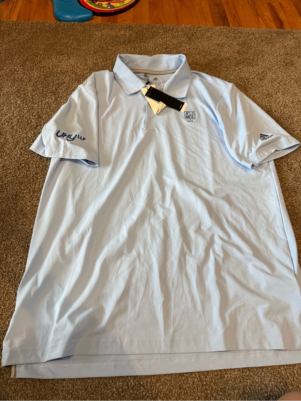 adidas Light Blue Men's Polo Shirt with Subtle Logos